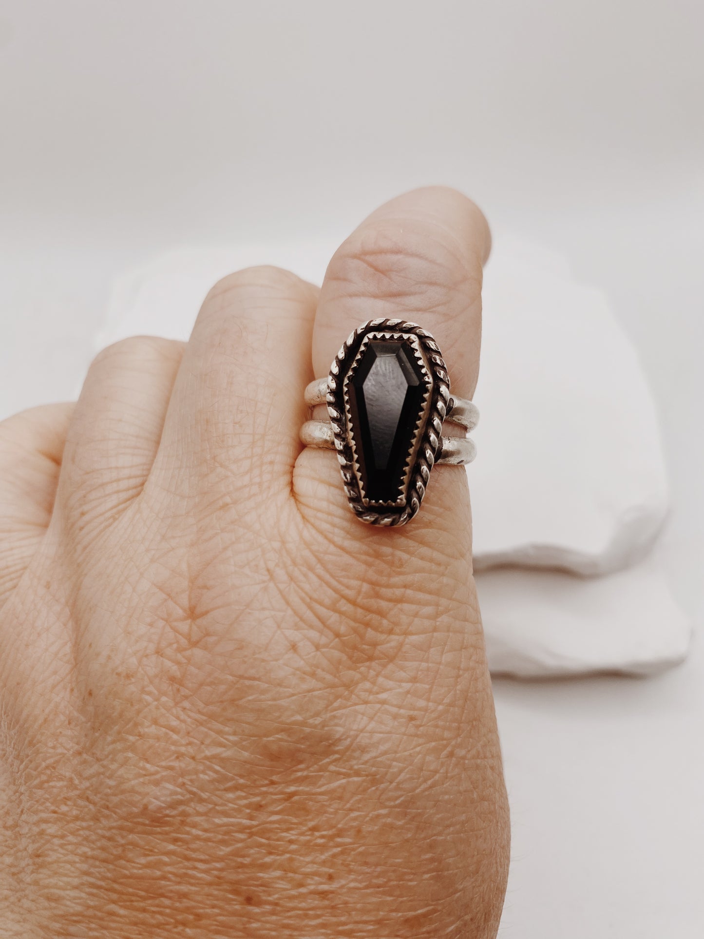 Onyx Coffin with Lasso Border